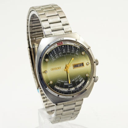 Vintage Orient College Multi-Year Calendar Automatic Green Dial Steel wristwatch